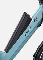 Close-up of a blue bicycle with a black battery pack labeled 'ENGWE' on a white background.
