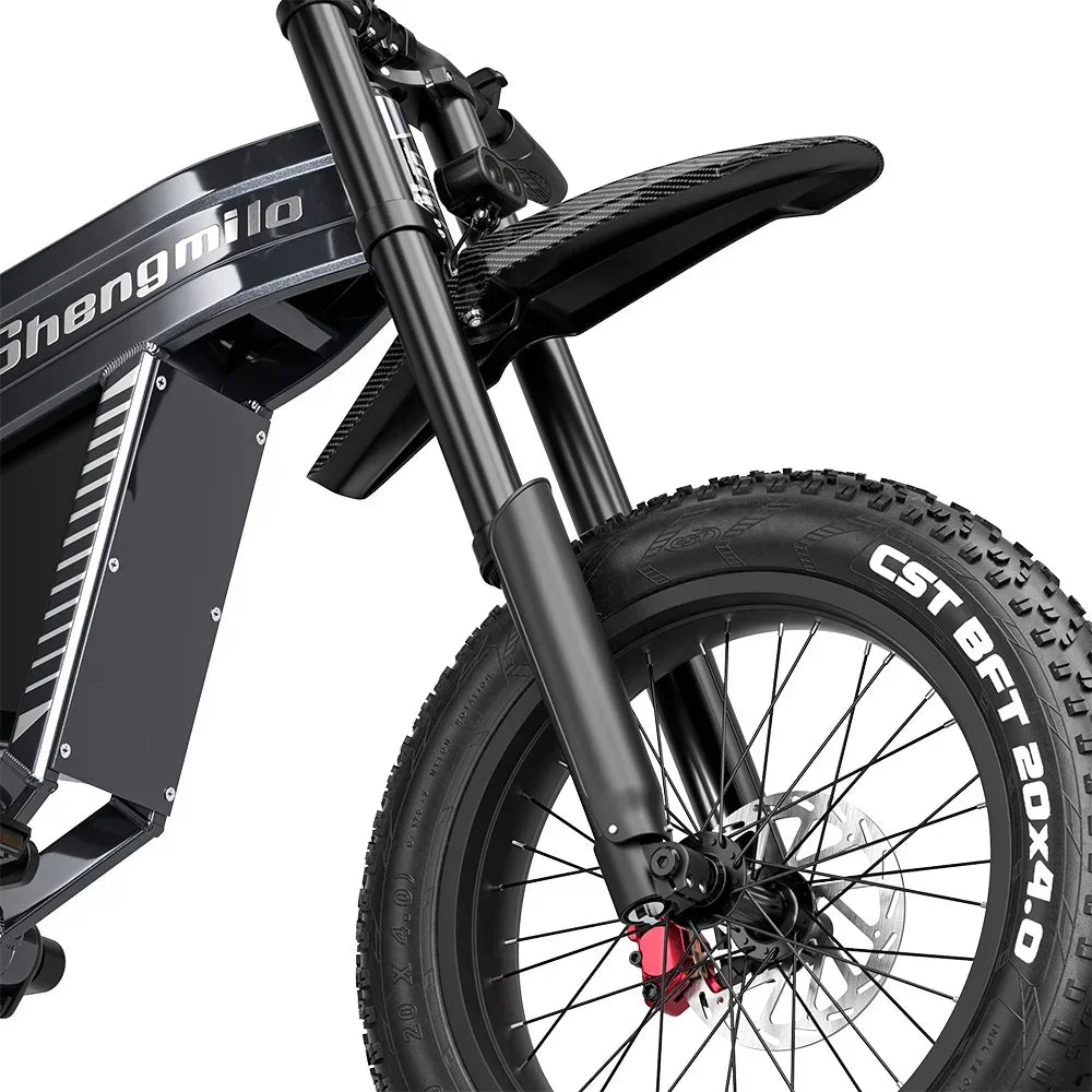Close-up of a black electric bike with CST tire on a white background