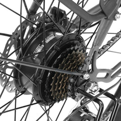 Close-up of a bicycle rear wheel with gear and chain mechanism on a white background